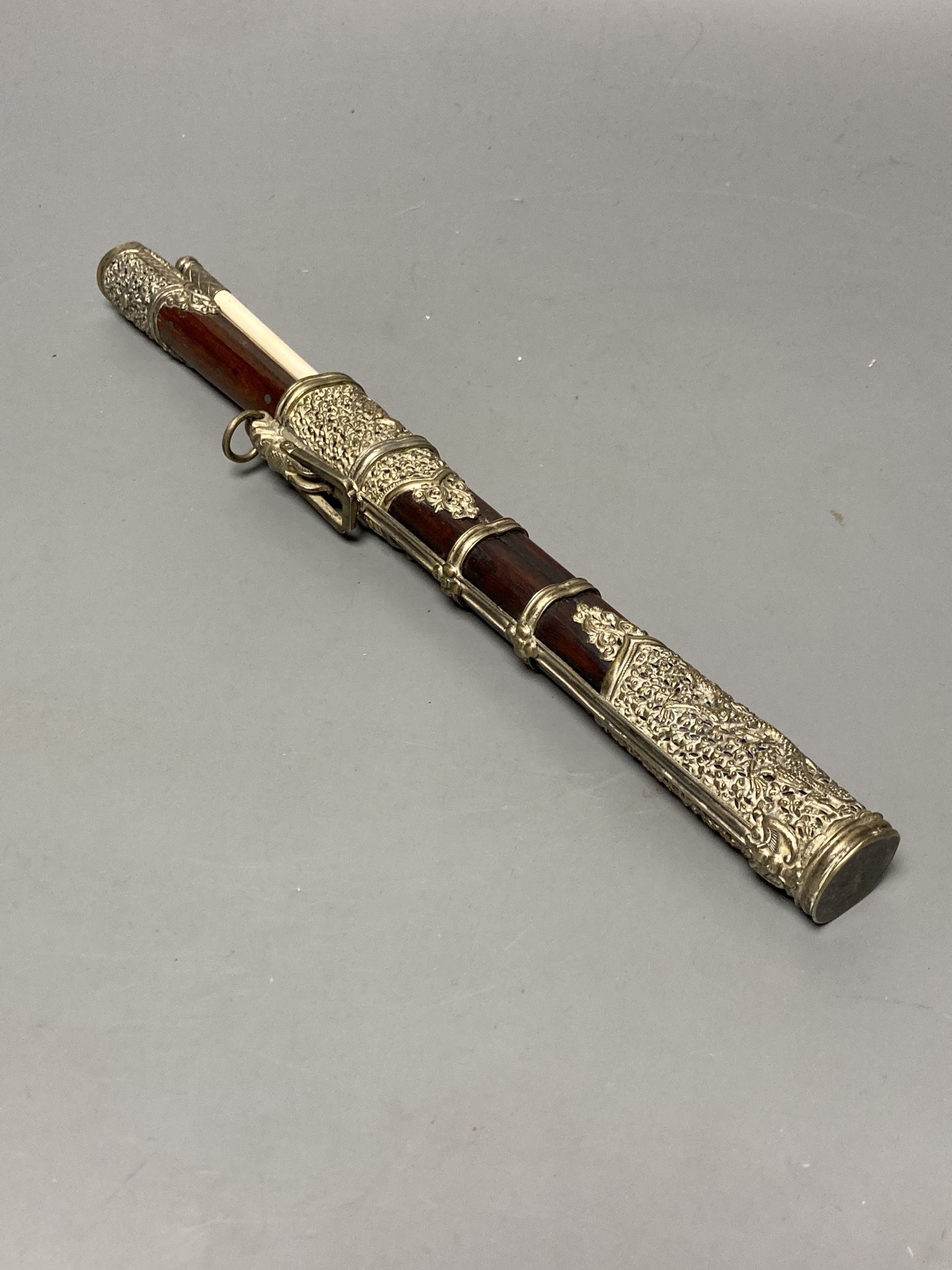 A Tibetan rosewood and white metal mounted chopsticks and knife set